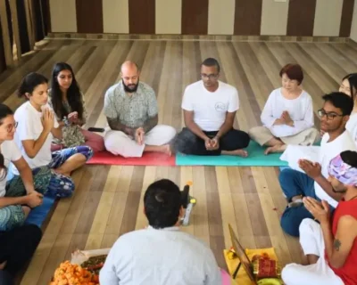 Yoga-teacher-training-students-participating-in-a-traditional-opening-ceremony-at-Rishikesh-Yoga-Valley-India